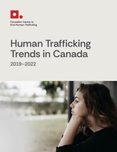 A report cover titled Human Trafficking Trends in Canada 2019–2022 from the Canadian Centre to End Human Trafficking, featuring a young woman sitting and gazing out a window.